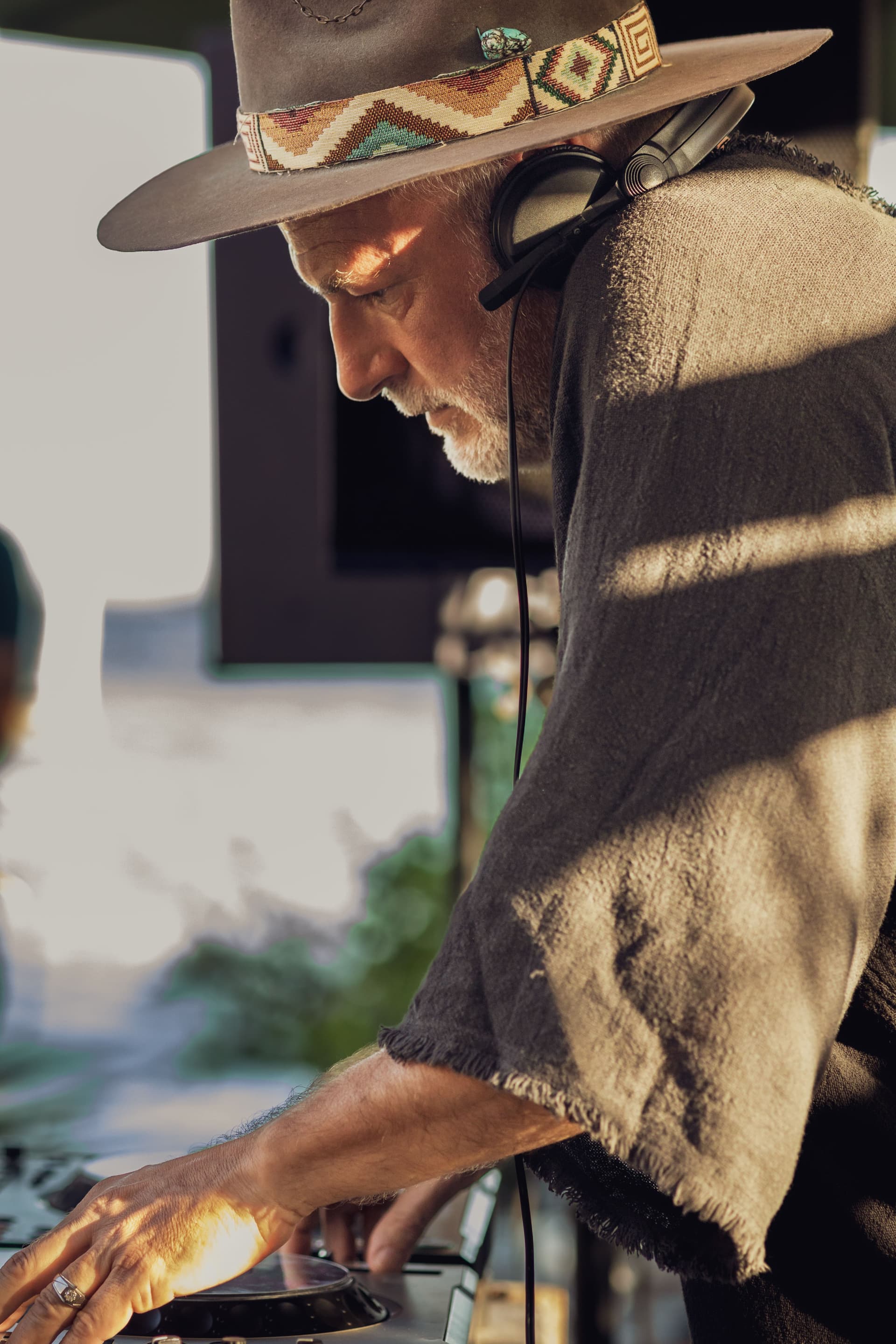 DJ performance and acoustic harmony on the wooden deck